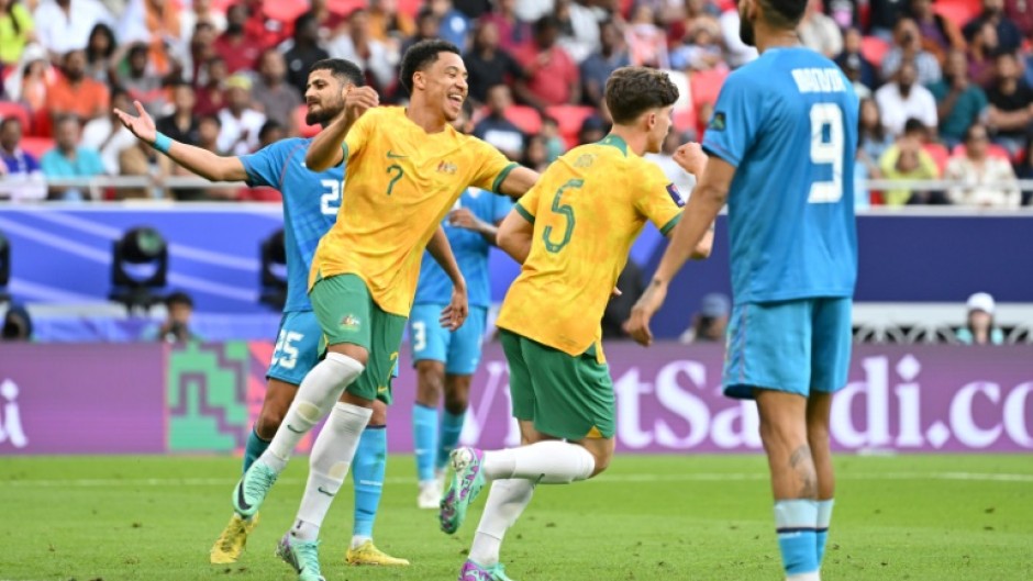 Jordan Bos celebrates after scoring Australia's second against India