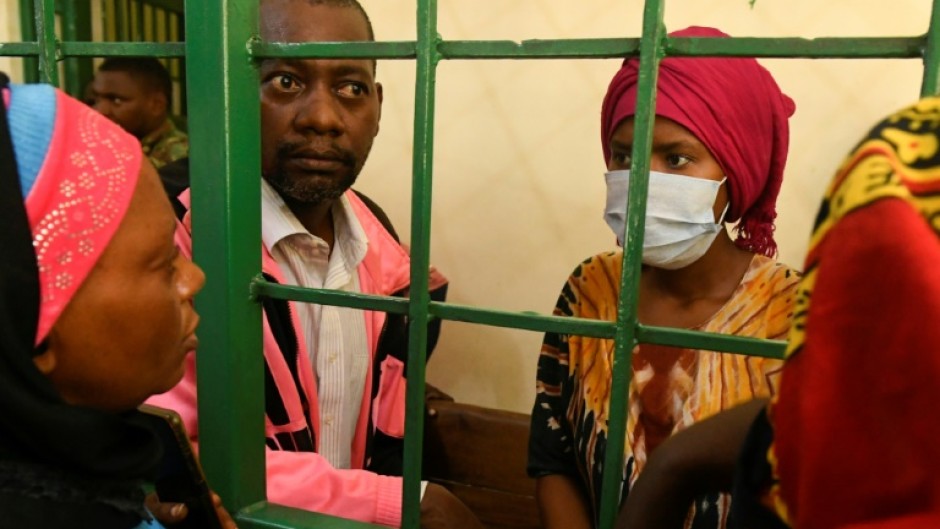 Paul Nthenge Mackenzie (second L) was arrested in April after bodies were discovered in the Shakahola forest near the Indian Ocean