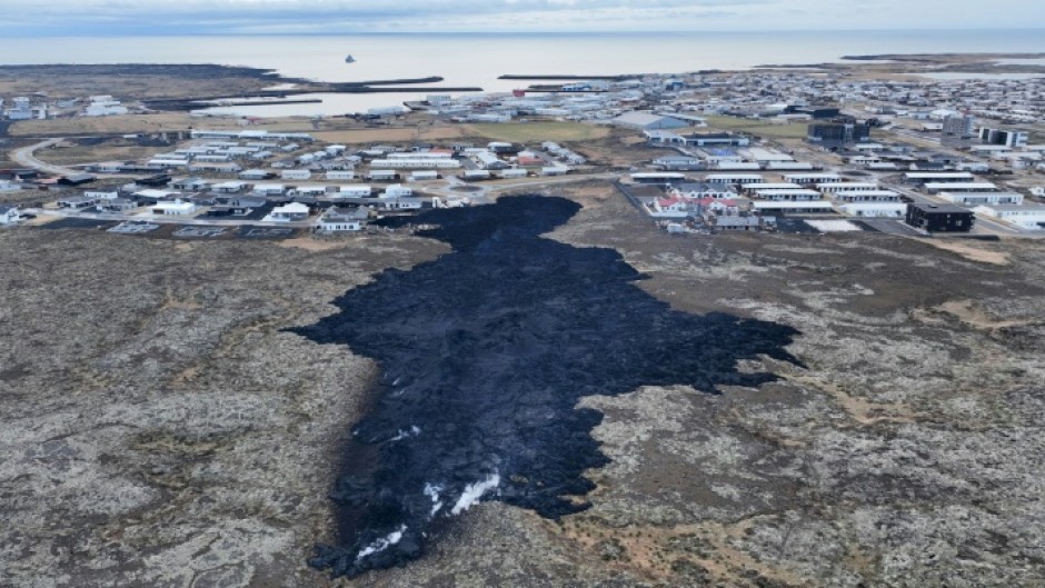 On Sunday, a volcanic fissure opened up in a field near the fishing town of Grindavik -- which had been hastily evacuated just hours earlier