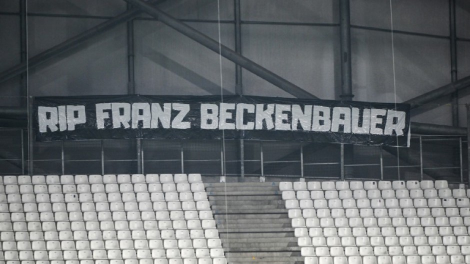 A banner pays tribute to late German football legend Franz Beckenbauer. He will be farewelled at a ceremony in Munich on Friday