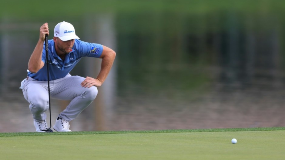 American Sam Burns lines up a putt on the way to an 11-under par 61 and the second-round lead in the US PGA Tour American Express tournament in La Quinta, California