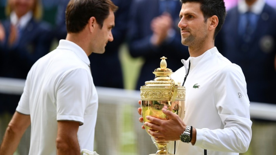 Roger Federer and Novak Djokovic (right) have won 46 Grand Slam titles between them