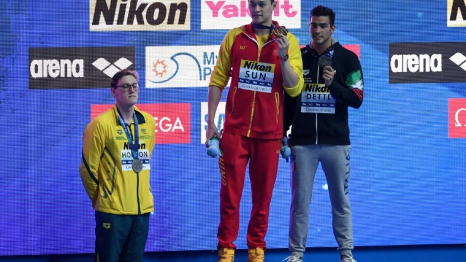 Australia's Mack Horton (L) refused to stand on the podium with gold medallist Sun Yang (C) at the 2019 world championships