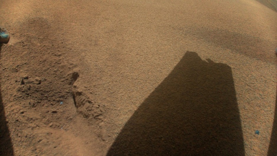 This NASA photo obtained January 25, 2024 shows the Ingenuity Mars helicopter's rotor blade damaged during flight landing