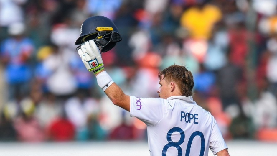 England's Ollie Pope celebrates after scoring a century 