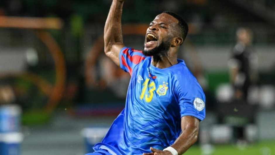 Meschack Elia celebrates scoring for DR Congo against Egypt. 