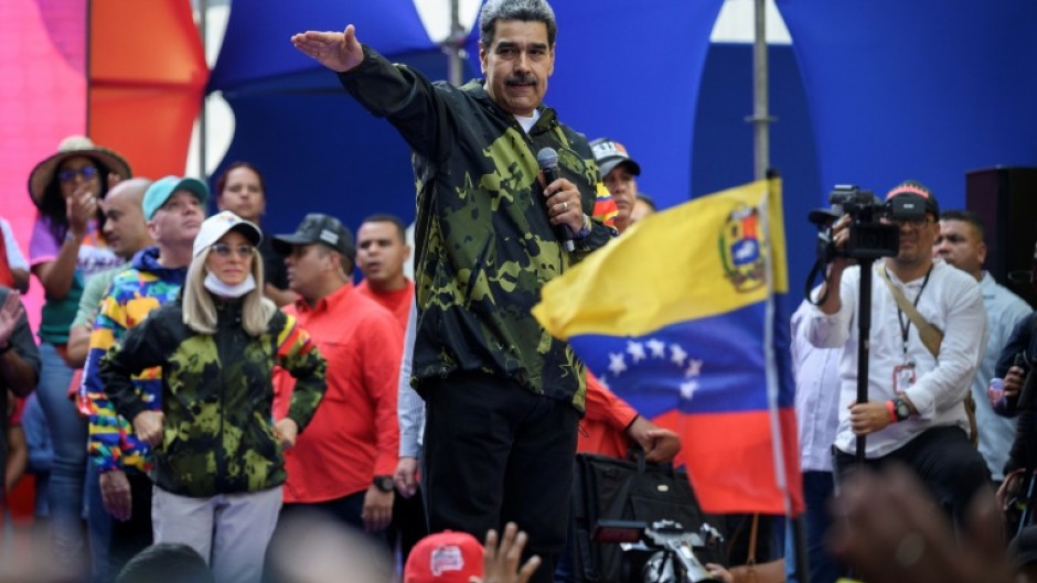 Venezuelan President Nicolas Maduro greets supporters during a rally in Caracas on January 23, 2024