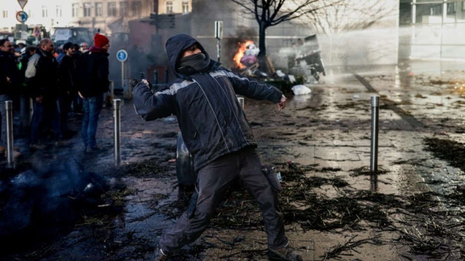 There were clashes in Brussels as farmers rallied outside the EU Parliament