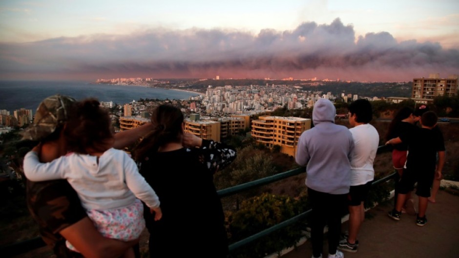 Wildfires that swept through the hills of Vina del Mar, along Chile's central coast, have left at least 19 people dead