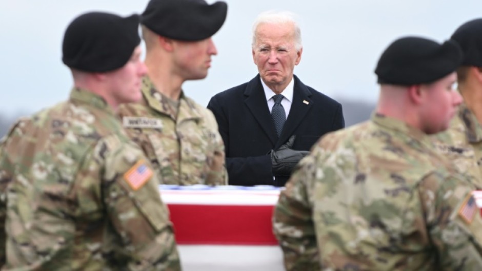 US President Joe Biden watches the return of the remains of three US soldiers killed in a drone attack in Jordan