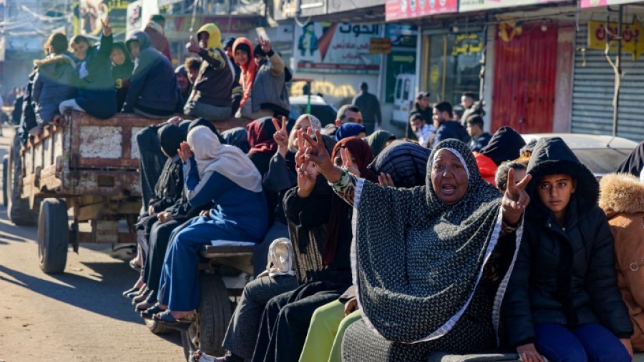 People use a tractor as a means of transportation in Rafah in the southern Gaza Strip on February 4, 2024, as fighting continues between Israel and the Palestinian Hamas group.