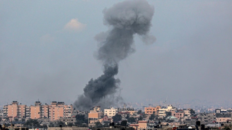 Smoke rises over the Gaza city of Khan Yunis following Israeli bombardment on February 5, 2024 