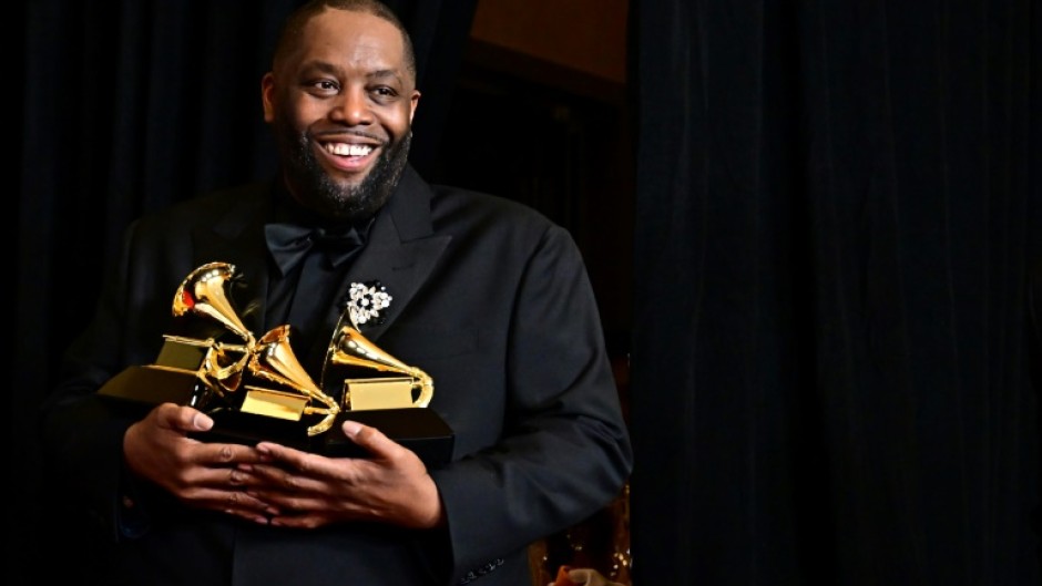 US rapper Killer Mike poses in the press room with the Grammy for Best Rap Performance, Best Rap Album and Best Rap Song during the 66th Annual Grammy Awards at the Crypto.com Arena in Los Angeles on February 4, 2024