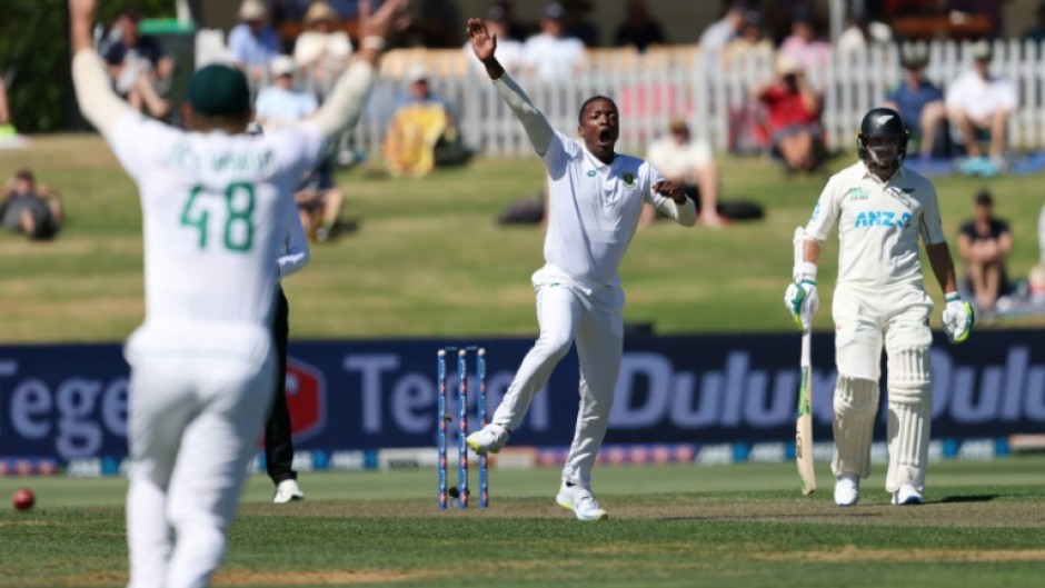 South Africa's Tshepo Moreki celebrates claiming Devon Conway's wicket during day one of the first Test against New Zealand