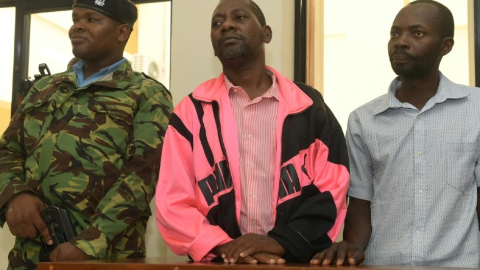 Self-proclaimed pastor Paul Nthenge Mackenzie (C) has also been charged with terrorism, manslaughter as well as child torture and cruelty