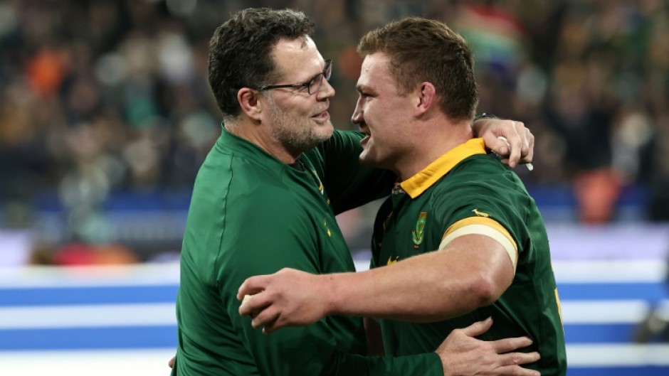 Rassie Erasmus (L) eyes a historic third successive Rugby World Cup title after committing to the Springboks till 2027