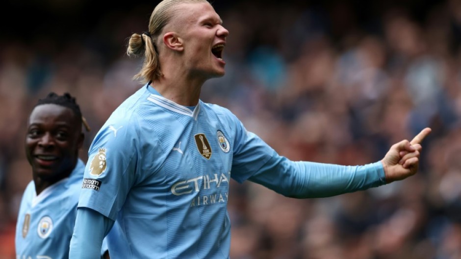 Manchester City striker Erling Haaland celebrates scoring against Everton