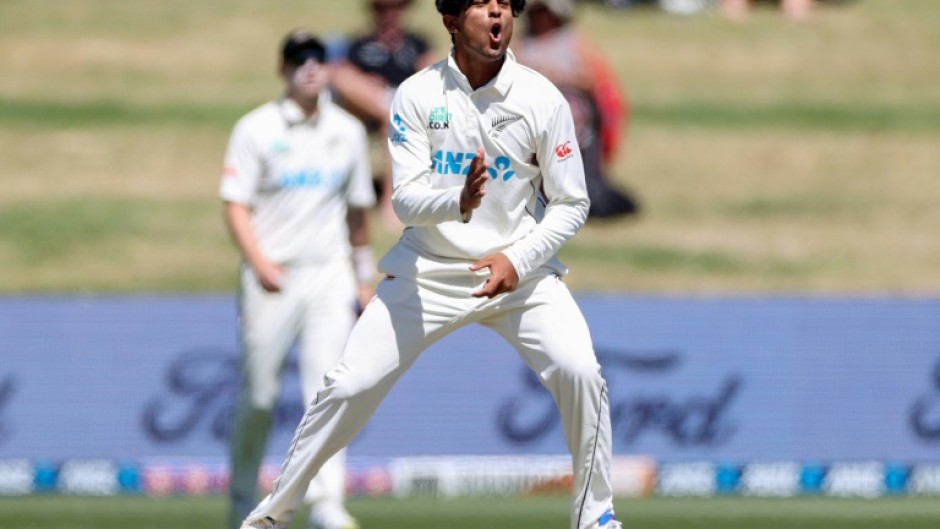 New Zealand's Rachin Ravindra celebrates the wicket of South Africa's Zubayr Hamza