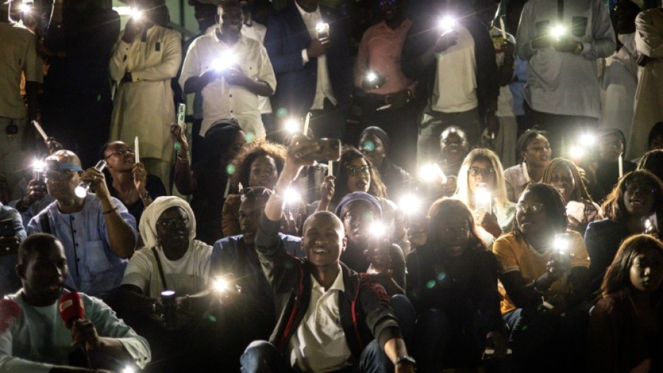 Members of the Senegalese media at a vigil to protest against police violence 