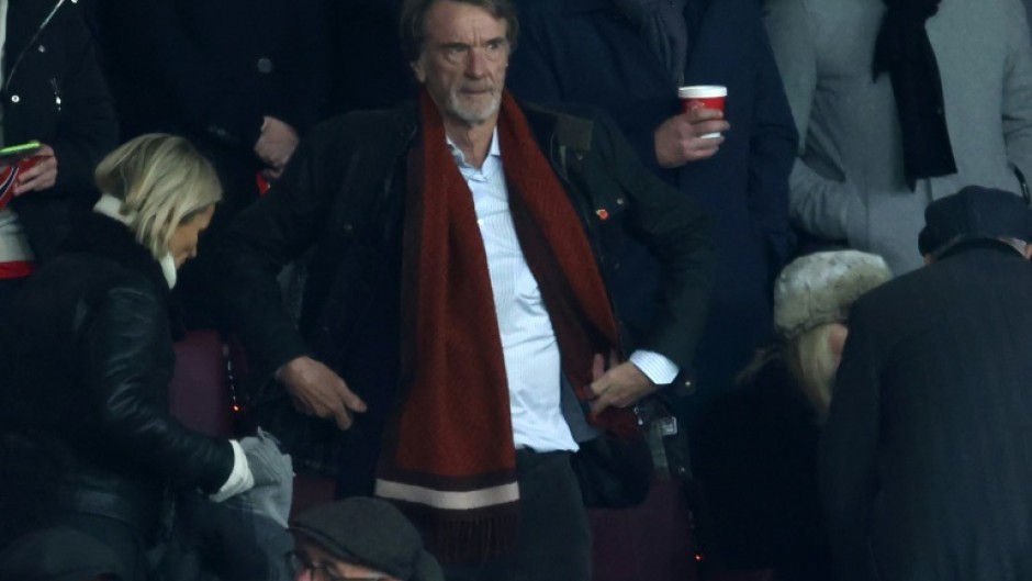 Manchester United's prospective investor Jim Ratcliffe (C)