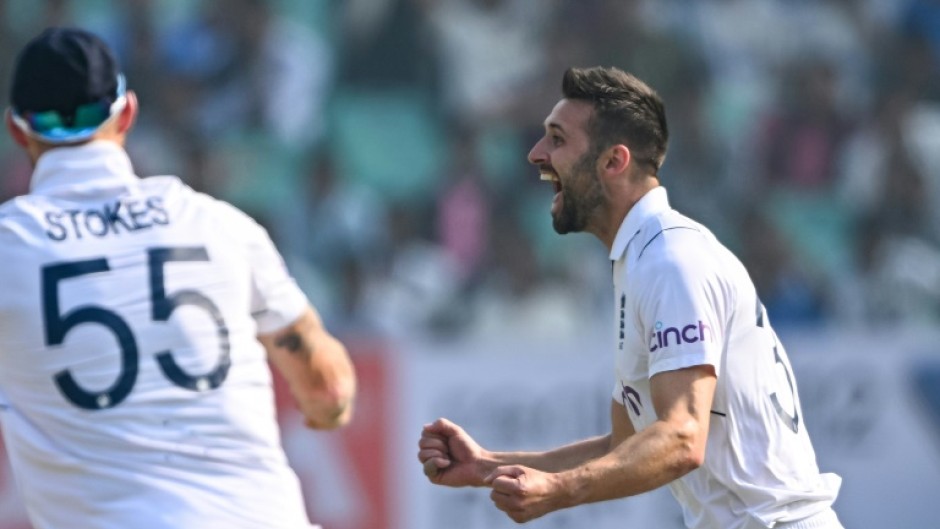 Mark Wood celebrates the wicket of Shubman Gill