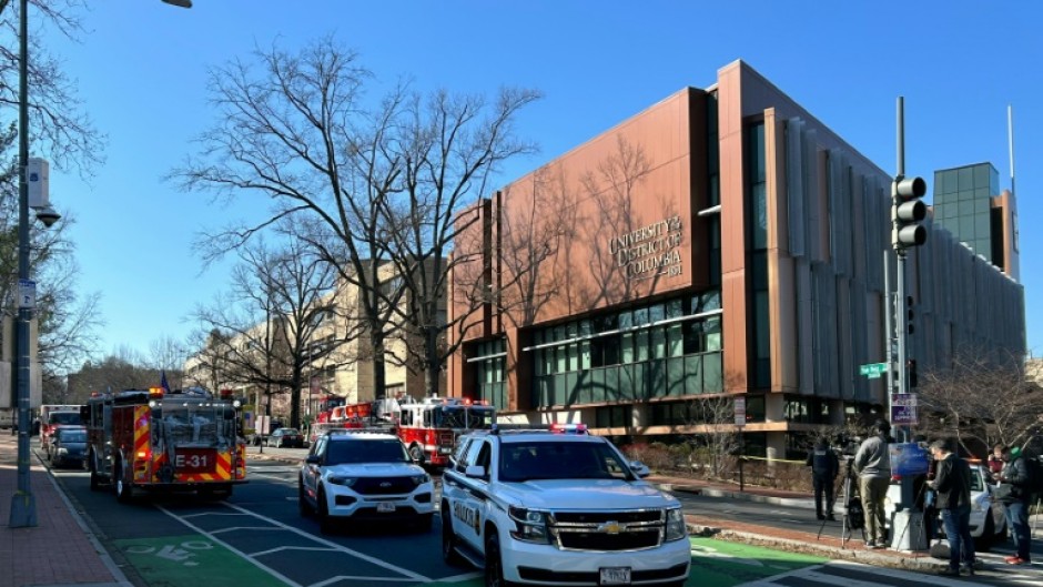 US Secret Service vehicles block access to a street leading to the Embassy of Israel in Washington, DC on February 25, 2024 after a man self-immolated there