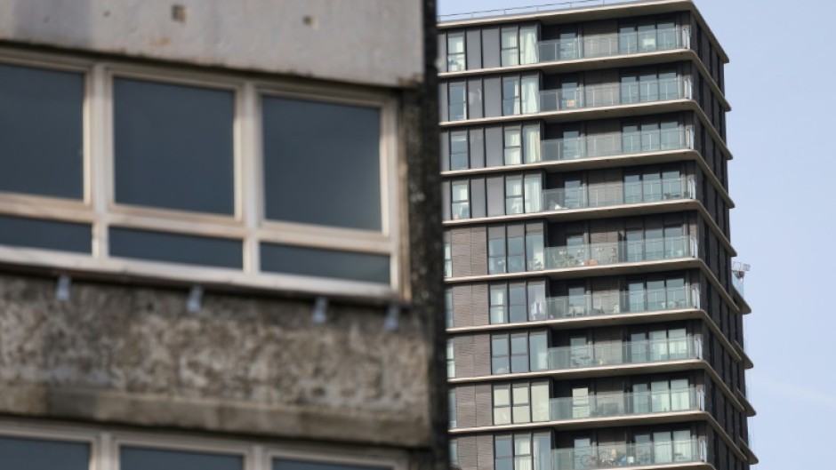 A crumbling housing estate in Stratford next to the gleaming luxury apartments of Olympic Park