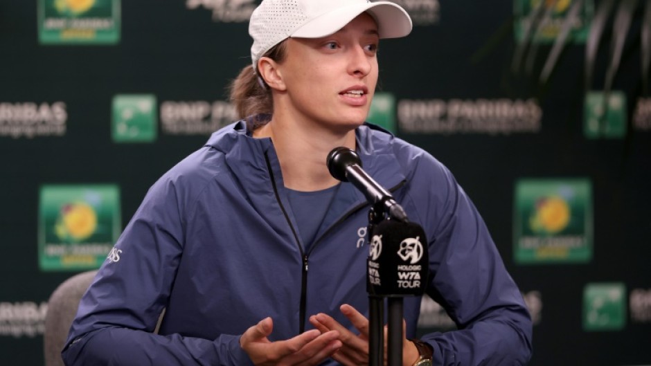 World number one Iga Swiatek of Poland fields questions from the media before the Indian Wells WTA-ATP Masters