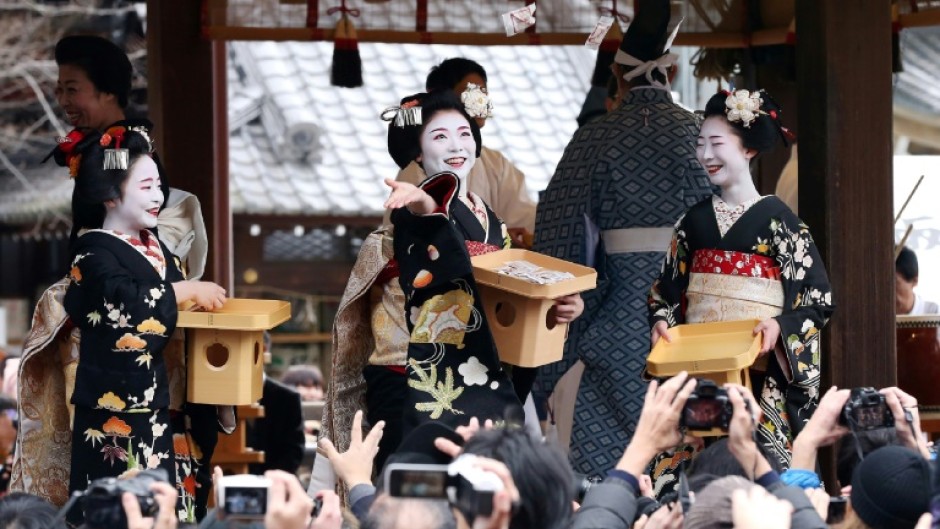 Kyoto's geisha, here celebrating a spring festival, perform traditional Japanese dance, music and games