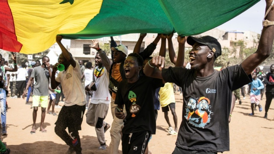 Thousands of Faye's supporters filled a sandy football pitch in a northern district of Dakar