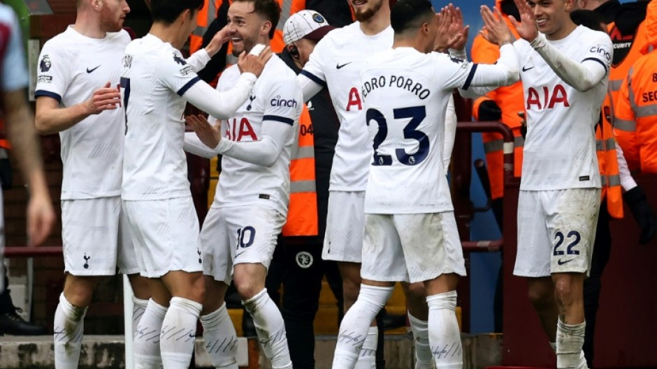 Tottenham celebrate during their victory at Aston Villa