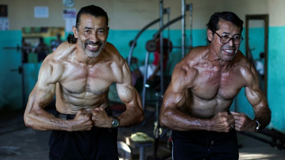 Brothers Walter (L) and Arturo Perez, both in their 60s, were once champion bodybuilders in Nicaragua; now they have a fast-growing TikTok following as the 'Bodybuilding Grandfathers' 