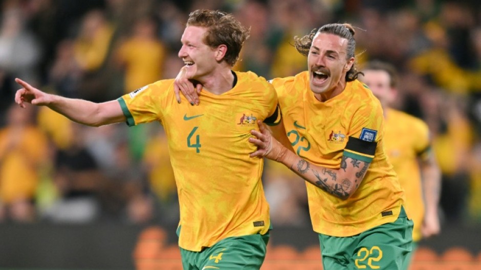 Australia's Kye Rowles celebrates scoring against Lebanon