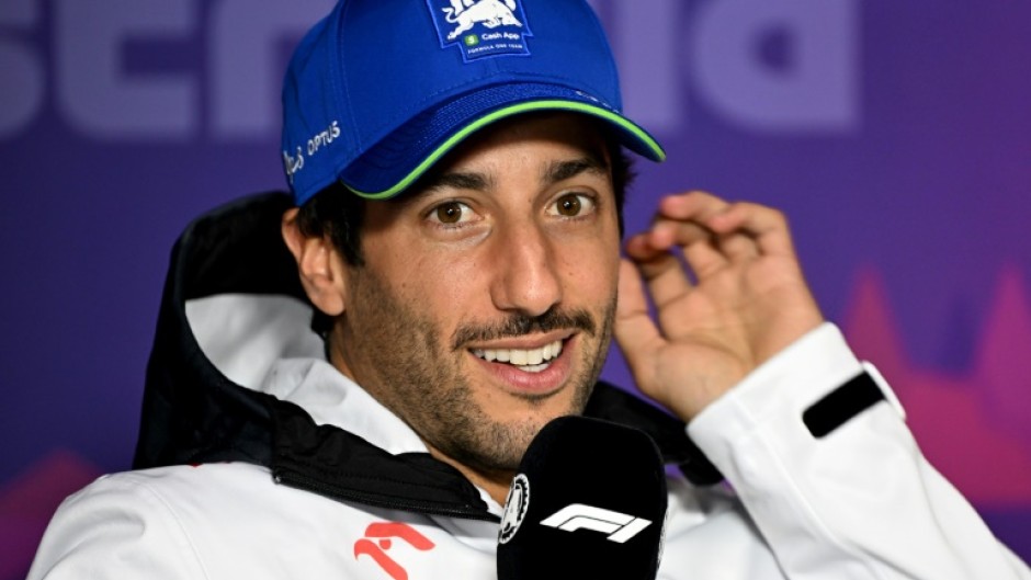 RB's Australian driver Daniel Ricciardo speaks at a press conference in Melbourne