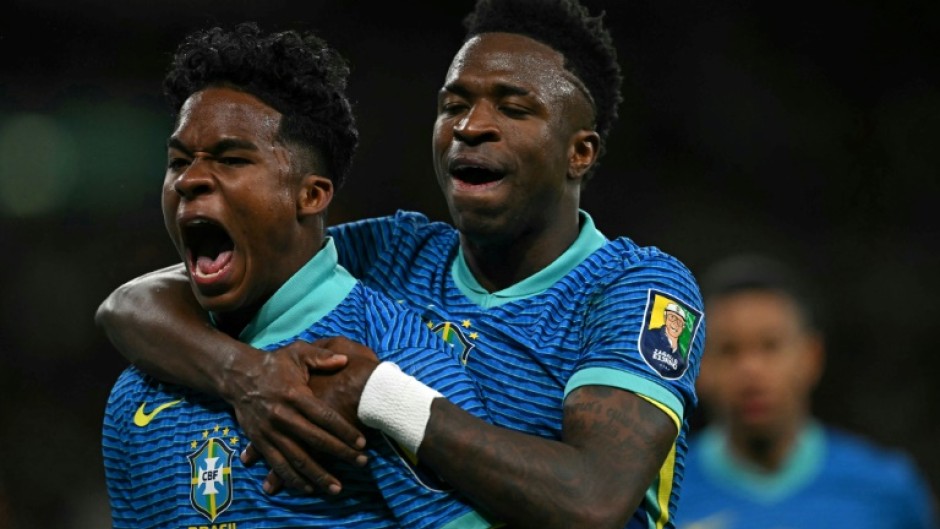 Brazil's Endrick (L) celebrates with Vinicius Junior after his winner against England