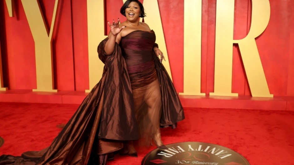 Pop star Lizzo, seen here attending the 2024 Vanity Fair Oscar Party, said she is "tired of putting up with being dragged by everyone in my life and on the internet"