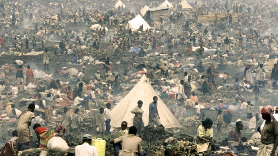 Tens of thousands of  Rwandan refugees pack into a makeshift camp just north Goma on July 17, 1994