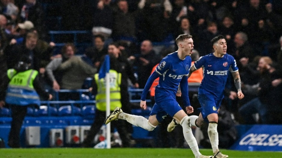 Chelsea's Cole Palmer (left) celebrates after scoring the winning goal against Manchester United at Stamford Bridge