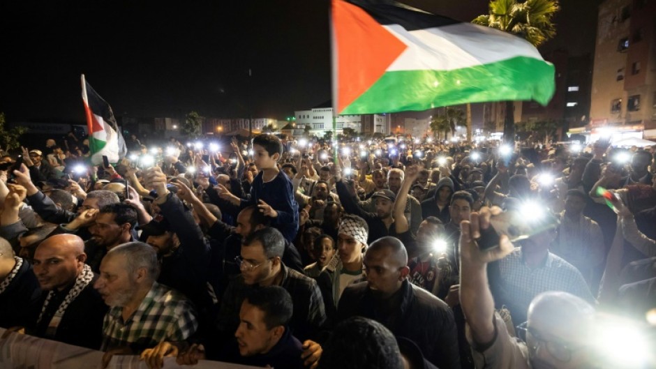 Thousands of people protested in Morocco's commercial capital Casablanca against 'massacres' in the Gaza Strip and against the country's ties with Israel