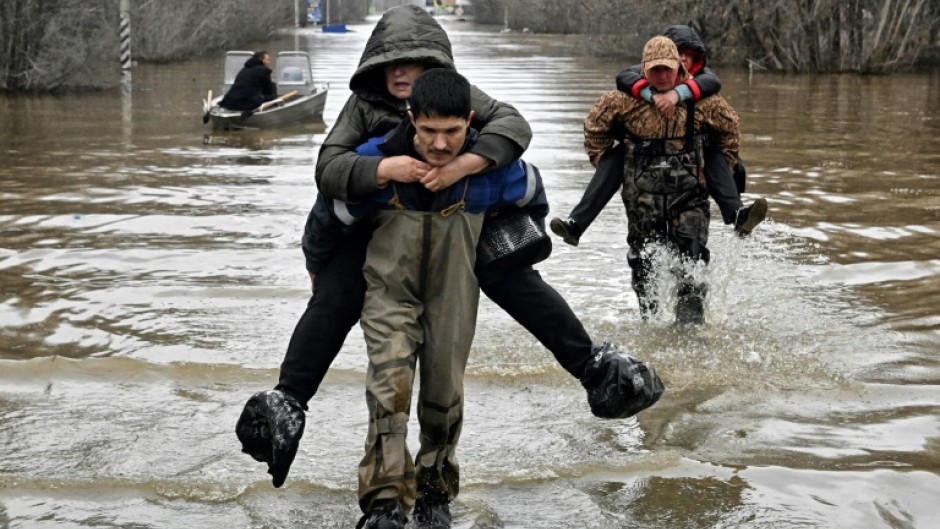 Overflowing rivers had covered whole villages and towns in northern Kazakhstan and Russia's southern Urals 