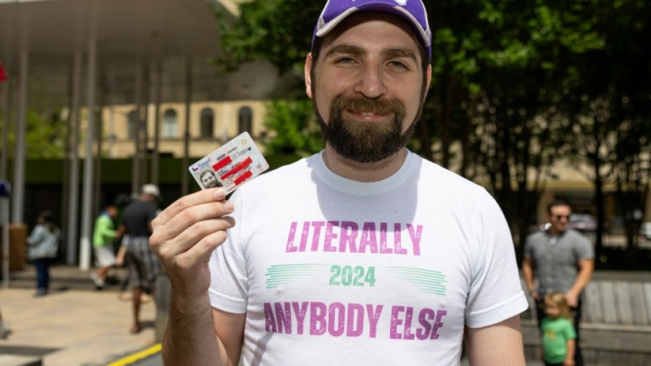 'Literally Anybody Else' poses with his driver's license, hoping for luck on his 2024 White House bid