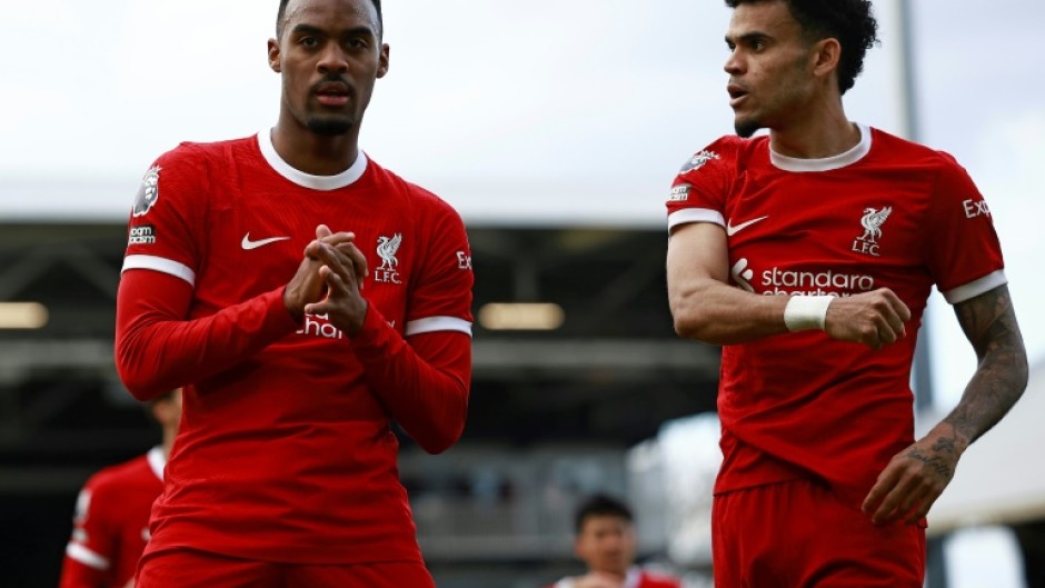 Liverpool's Ryan Gravenberch (L) celebrates scoring against Fulham