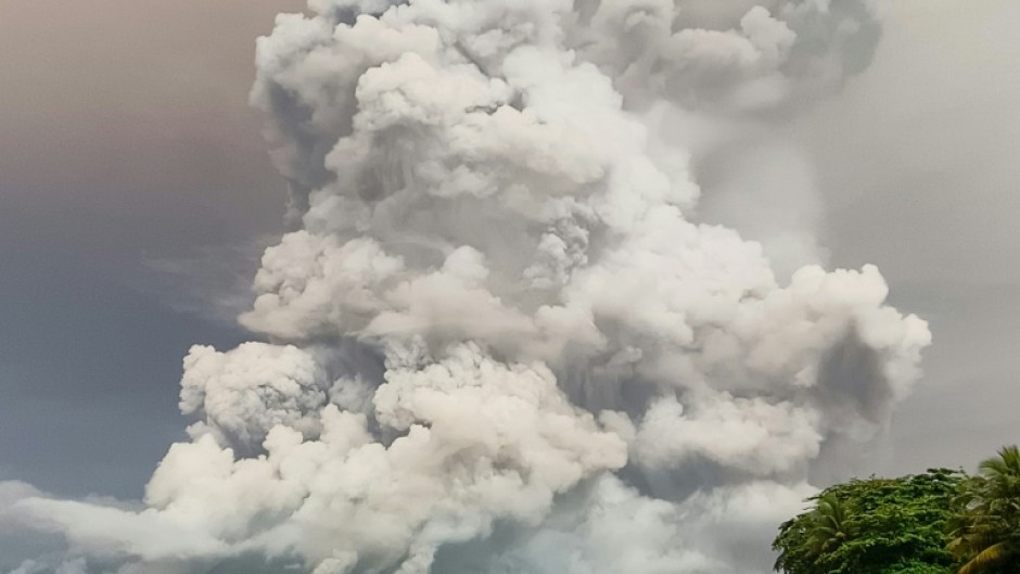 An eruption from Mount Ruang volcano is seen from neighbouring Tagulandang island