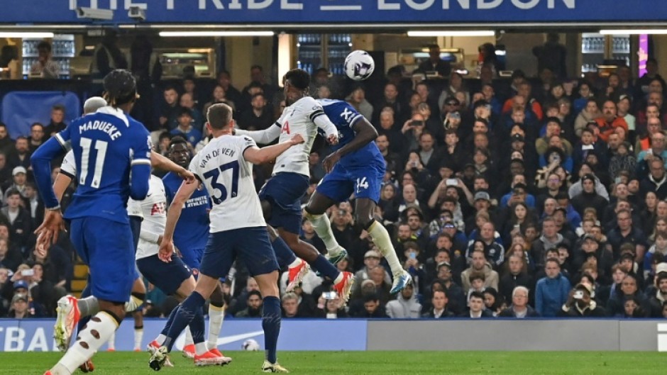 Chelsea's Trevoh Chalobah (R) scores against Tottenham