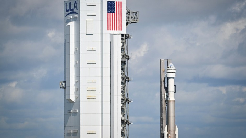 A Boeing Starliner capsule atop an Atlas V rocket sits on the launch pad at Cape Canaveral, Florida, May 4, 2024