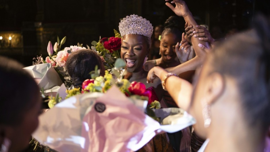 Lyse Amissah (c) celebrates her 2024 victory