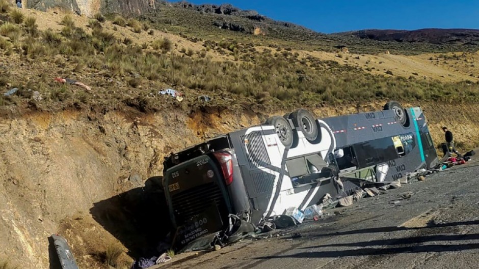 The bus was traveling from Lima to the city of Ayacucho when it rolled down a ledge, landing upside down