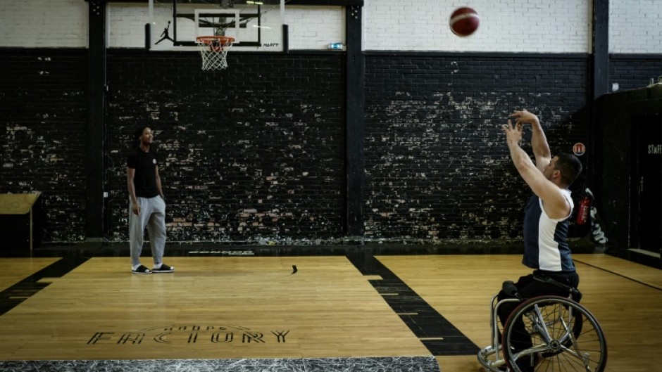 French Paralympic basketball player Sofyane Mehiaoui trains at the Hoops Factory in Aubervilliers, east of Paris on May 15, 2024.