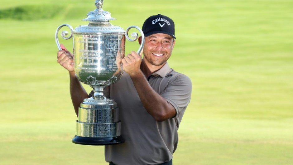 American Xander Schauffele holds the Wanamaker Trophy after winning the PGA Championship at Valhalla for his first major title