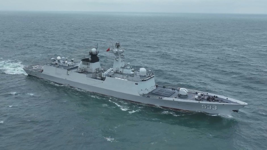 This handout photograph released on May 24, 2024 by the Eastern Theater Command of China's People's Liberation Army shows a naval vessel sailing at sea during the "Joint Sword-2024A" milirary drill  